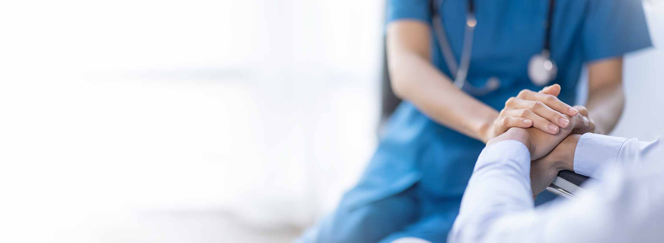 Vertex physician with a patient